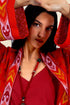 Coat in cotton gauze with asymmetric hemline